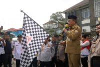 LEPAS PESERTA MUDIK GRATIS: Gubernur Jambi, Al Haris, memberikan sambutan sekaligus melepas secara resmi keberangkatan peserta Program Mudik Gratis Pemprov Jambi 2026 di Terminal Tipe A Alam Barajo, Sabtu (14/3). Program ini merupakan bentuk kepedulian pemerintah dalam membantu masyarakat dan pelajar merayakan Lebaran di kampung halaman dengan aman dan nyaman. (FOTO : IST)