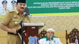 FOTO : Wakil Bupati Tanjung Jabung Barat Drs. H. Amir Sakib Saat Membuka Sosialisasi ZIS Badan Amil Zakat Nasional Kabupaten Tanjung Jabung Barat di Balai Pertemuan Kantor Bupati, Senin (02/03/20)