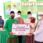 Bupati H. Anwar Sadat dan Wabup Hairan Serahkan Bantuan Dana CSR Bank 9 Jambi serta menyerahkan bantuan mushaf Al Qur’an untuk Musholla Al Ikhlas jln Cempaka Putih RT 14 Desa Purwodadi. FOTO : Prokopim