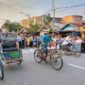 Peserta lomba saat memacu Becak dari Garis Start Depan Rumah Jabatan Bupati, Jum'at (11/8/23). FOTO : Ist
