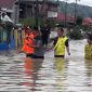 Aktivitas Warga Desa Lubuk Suli Kabupaten Kerinci Lumpuh Total Akibat Banjir Sejak Rabu. FOTO : Inews.id