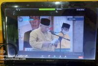 FOTO : Bupati Tanjab Barat Dr. Ir. H. Safrial, MS saat Sambutan pada Peringatan HUT Kabupaten Tanjab Barat ke 55 Tahun 2020 di Balai Perteman secara virtual, Senin (10/08/20).