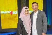CEO Salmi Halal Tour, Gita Indah Puspita (kiri) dan suami, H.M. Nuh (kanan).  FOTO : YOGA