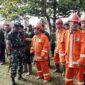 Komandan Kodim 0416/Bute, Letkol Inf Dedy Pungky Irawanto, S.I.P., M.I.Pol, memimpin Apel Gelar Pasukan Siaga Darurat Menghadapi Bencana Kebakaran Hutan dan Lahan (Karhutla) tahun 2025
