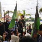 Aksi Unjuk Rasa HMI bersama Masyarakat Peduli Listrik Tanjung Jabung Barat, Senin (23/5/22). FOTO : Ist