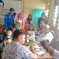 Ditpolairud Polda Jambi Berikan Pengobatan Gratis dan Sembako ke Masyarakat Pesisir Terpencil. FOTO : Dhea/Ist