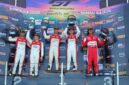 Pebalap Indonesia Sean Gelael dari tim Garage 75 (paling kanan) bersama para pemenang lainnya di atas podium Race 1 GT World Challenge Asia 2026 di Sirkuit Internasional Pertamina Mandalika, Lombok. (FOTO : Dok. WKI/LT)