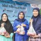 Kebahagiaan warga saat menerima paket daging kurban dalam program 