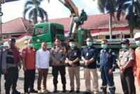 Dok. Kegiatan PetroChina Serah Terimakan Bantuan Material Garasi Mobil di Polres Tanjab Timur. FOTO : Humas