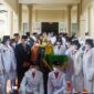Bupati Muaro Jambi Hj. Masnah Busro Saat Hadiri Upacara Peringatan Hari Amal Bhakti Kementrian Agama di Kantor Kemenag Muaro Jambi, Senin (3/1/22). FOTO : Noval
