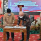Penandatanganan NPHD dan Berita Acara Serah terima (BAST) Hibah Tanah dari Pemprov Jambi Kepada BKN RI di Auditorium Rumah Dinas Gubernur Jambi, Selasa (18/01/22). FOTO : Noval/Kominfo.
