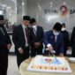 Gubernur Jambi dan Wakil Gubernur Jambi didampingi Direktur Utama Bank Jambi beserta direksi lainnya Memotong Tumpeng Peringatan HUT Bank Jambi ke-59, Sabtu (8/1/22). VOVAL/IST