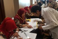 FOTO : Meja Absensi Kehadiran Peserta Tes SKD CPNS Kabupaten Tanjung Jabung pada hari Pertama di Lt. 5 BW Luxury Hotel Jambi, Kamis (20/02/20)