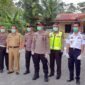 FOTO : Kapolres Tanjabbar dan Dirlantas Polda Jambi Saat Berada di Pos Terpadu Sterilisasi COVID-19 di Lintas Timur Jambi-Riau KM 167 Subsektor Batang Asam Polsek Tungkal Ulu, Senin (30/03/20)