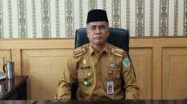 FOTO : Plt. Kepala Dinas Pendidikan dan Kebudayaan Kota Jambi H. Mukhlis, S.Sos.I