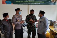 Kapolres Tanjabbar Tinjau Serbuan Vaksinasi TNI Kodim 0419/Tanjab  di Desa Pamatang Lumut, Kecamatan Betara, Sabtu (13/9/21).