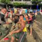 Tim Tarik Tambang Korem 042/Gapu Saat Final Melawan Tim Dinas PUPR Prov Jambi di halaman kantor Gubernur Jambi, Jumat (7/1/22). FOTO : Penrem.