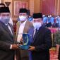 Gubernur Jambi Al Haris saat Hadiri Wisuda Sarjana Angkatan ke 1 IAI MA di Abadi Convention Center, Rabu (12/01/22). FOTO : Val/Diskominfo.