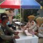 Vaksinasi di wilayah RT 05 Kelurahan Tanjung Pinang, Kecamatan Jambi Timur, Kota Jambi, Minggu (27/2/22). FOTO : PENREM