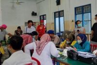 Pelaksanaan serbuan vaksinasi massal di Yayasan Budhi Luhur Kuala Tungkal, Senin (11/4/22). FOTO : lintastungkal.com