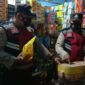 Anggota Polsek Bahar Selatan Patroli dan Monitoring Minyak Goreng di Desa Bukit Subur