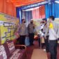 Irwasda Polda Jambi KOMBES Pol Raden Heru Prakoso didampingi Kapolres Tanjab Barat AKBP Muharman Arta serta Kabag Ops KOMPOL Jan Manto Hasiholan Sianturi saat mengecek Pos Terpadu Polres di Pelabuhan LLASDP Kuala Tungkal, Jum'at (29/4/22). FOTO : Lintastungkal