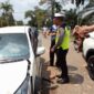 Anggota Satlantas Polres Muaro Jambi Saat di Lokasi Kejadian. FOTO : Dhea.