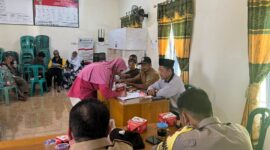 Kegiatan pencabutan Nomor dan Jadwal Kampanye Calon Kades Delima di Aula Kantor Desa Delima, Kecamatan Tebing Tinggi, Tanjung Jabung Barat, Senin (22/8/22). FOTO : Polsek Tebing Tinggi