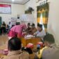 Kegiatan pencabutan Nomor dan Jadwal Kampanye Calon Kades Delima di Aula Kantor Desa Delima, Kecamatan Tebing Tinggi, Tanjung Jabung Barat, Senin (22/8/22). FOTO : Polsek Tebing Tinggi