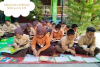 Siswa SDN 005/V Kuala Tungkal mengikuti Program Literasi membaca. FOTO : Ist