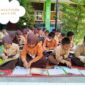 Siswa SDN 005/V Kuala Tungkal mengikuti Program Literasi membaca. FOTO : Ist