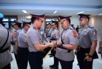 Tongkat Komando Berganti: AKBP Maulia Lanjutkan Estafet Kepemimpinan AKBP Agung di Tanjab Barat Sertijab Berlangsung di Mapolda Jambi. FOTO : IST