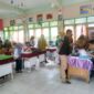 Panitia PPDB di SMPN 2 Kuala Tungkal, Kabupaten Tanjung Jabung Barat, Provinsi Jambi menerima Berkas Pendaftaran secara Offline. FOTO : LT