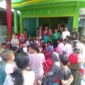Erham, S. Ag bersama Caleg Kader dan Panitia Pelaksana serta Warga FOTO : LT 