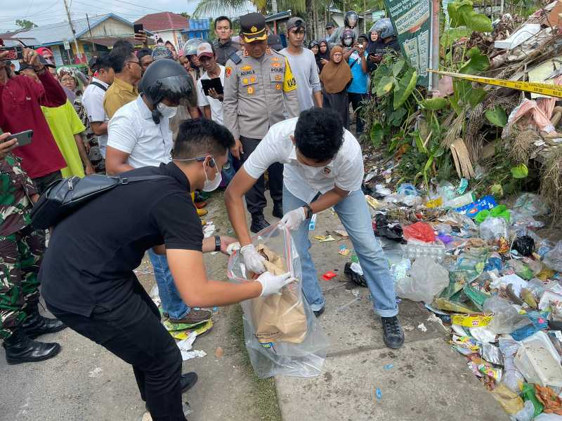 Kapolres Tanjung Jabung Barat AKBP Agung Basuki, SIK., MM bersama Tim Opsnal saat melakukan Olah TKP. FOTO : Dok Reskrim 