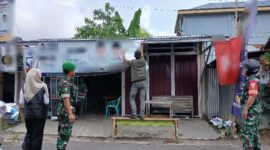 Dikawal Prajurit TNI Kodim 0419/Tanjab Petugas KPU dan Bawaslu tertibkan APK (Dok LT)