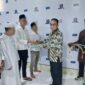Kalapas Kuala Tungkal Iwan Darmawan menyerahkan SK Remisi (Lapas)