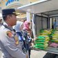 AKBP Agung Basuki bersama Pimcab Bulog Reny Lelianda dan Dinas DKP Handriathi Bustan tinjau Gerai Gerakan Pangan Murah (Ist)