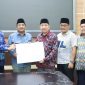 Bupati Anwar Sadat, Wakil Bupati Katamso bersama Ketua DPRD Hamdani, Wakil Ketua Muh Sjafril Simamora dan Hasam Basyri Harahap (pro)