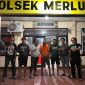Pelaku (Baju Orange) Yang Diamankan Unit Reskrim Polsek Merlung (hms)