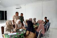 Pasiten Dim 0419/Tanjab Kapten Inf Rudi C Marpaung Memantau Kegiatan Bhakti Kesehtaan Hari Juang Kartika (ist)