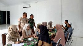 Pasiten Dim 0419/Tanjab Kapten Inf Rudi C Marpaung Memantau Kegiatan Bhakti Kesehtaan Hari Juang Kartika (ist)