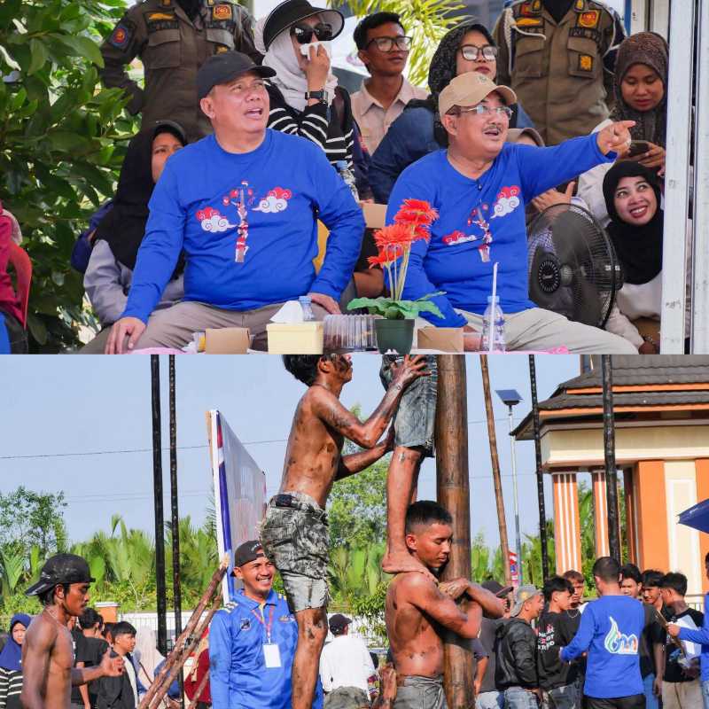 Bupati Tanjab Barat Anwar Sadat Didampingi Wakil Bupati Katamso Saat Menhadiri Panjat Batang Pinang (hms)
