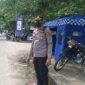 Kapolsek Muaro Jambi IPTU Wiwik Utomo Saat di Pos Pengamanan Pintu Masuk Kawasan Percandian Muaro Jambi. FOTO : Noval