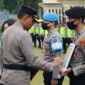 Kapolres Merangin AKBP Dewa N Nyoman Arinata, SIK, MH saat Pimpin Upacara PTDH terhadap 2 onkum personel Polres Merangin berinisial Bripda AS dan Brigadir RA, Senin (26/6/23) pagi.