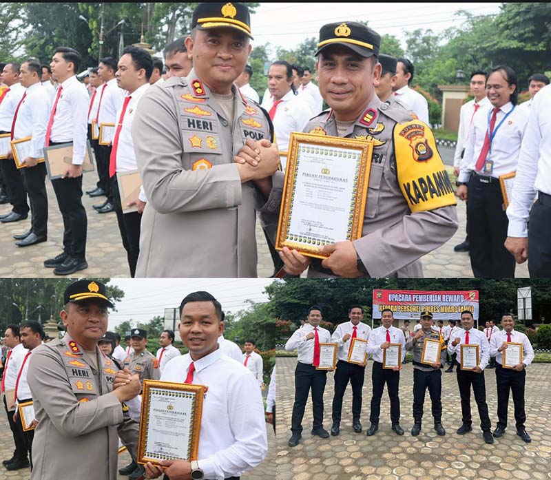 Kapolres Muaro Jambi AKBP Heri Supriawan Ketika Memberikan Penghargaan kepada personel Polres Muaro Jambi yang memiliki prestasi dan dedikasi dalam kinerja. FOTO : Viryzha