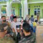 Kapolres Muaro Jambi AKBP Yuyan Priatmaja Saat Tinjau Gerakan 1 Juta Vaksinasi Kementrian Agama di MWC NU Sungai Bahar, Sabtu (23/4/22).