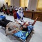 FOTO : Kapolres Tanjung Jabung Barat AKBP Guntur Saputo S.IK, MH saat Donor Darah HUT Bhayangkara ke 74, Rabu (24/06/20)