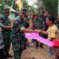 Kasrem 042/Gapu Kolonel Inf Ali Aminudin menutup secara resmi kegiatan TMMD Ke-117 Tahun 2023 di wilayah Kodim 0416/Bute di Lapangan Desa Talang Silungko Kec. Bathin II Pelayang Kab. Bungo, Kamis (10/8/23). FOTO : PENREM