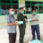 FOTO : Public Affair Manager PT. LPPPI H. Hermawan DBS, SH saat Menyerahkan Bantuan masker ke Dandim 0419/Tanjab Letkol Inf Erwan Susanto, S.IP, Selasa (16/06/20).